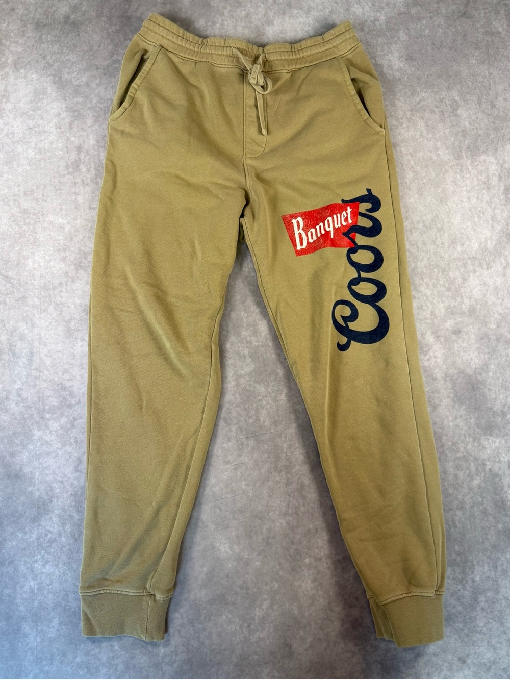 Coors Banquet unisex sweatpants size small Tan color